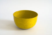 RachaelPots - Laura Bowl: White, a tall, yellow speckled ceramic bowl with a ribbed exterior, perfect for varied meals. Handcrafted in Brooklyn, featured at Athens Cooks.