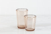 Zwiesel Fortessa | Veranda Double Old Fashioned, a 14oz brown tumbler, sits beside another on a light surface, showcasing its rustic, mouth-blown glass design.