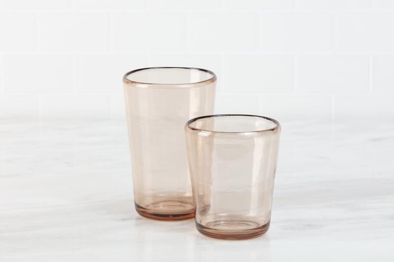 Zwiesel Fortessa | Veranda Double Old Fashioned, a 14oz brown tumbler, sits beside another on a light surface, showcasing its rustic, mouth-blown glass design.