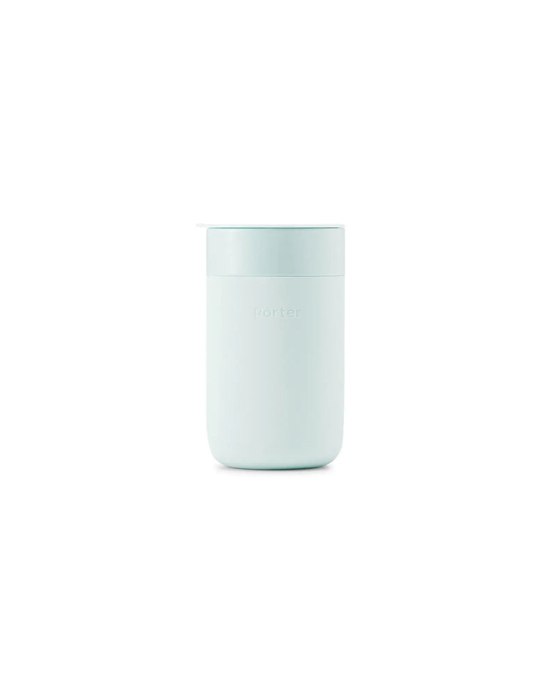 W&P - Reusable Ceramic Mug: Terrazzo Charcoal / 16 oz, featuring a white cylinder with a lid, designed for eco-friendly, microwave and dishwasher-safe convenience.