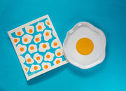 Bespoke Provisions - Eggs Swedish Dishcloth displayed with egg-themed design, perfect for cleaning tasks, biodegradable, compostable, and made from natural materials.