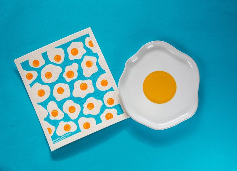 Bespoke Provisions - Eggs Swedish Dishcloth displayed with egg-themed design, perfect for cleaning tasks, biodegradable, compostable, and made from natural materials.