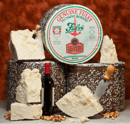 Nicola's Marketplace - Genuine Fulvi® Pecorino Romano DOP: 7 Ounces, displayed with wedges, crumbles, a cheese knife, red wine, and nuts, evoking a gourmet tasting experience.