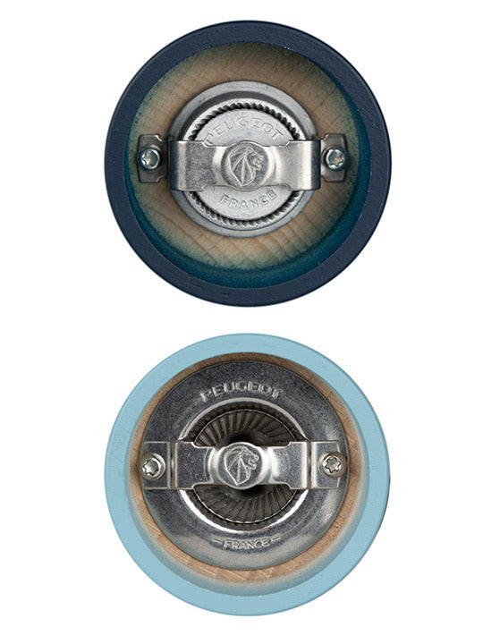 Peugeot | Tahiti Duo Salt + Pepper Mills, Air, showcasing the grinding mechanism with stamped clamp, featuring classic hourglass design and durable steel grinder for lifetime use.
