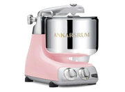 Ankarsrum Assistent Original® AKM6230 stand mixer in pastel pink with stainless steel bowl and control dials, ideal for mixing large dough batches.