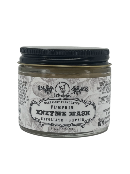Roots And Leaves - Pumpkin Enzyme Face Mask in a glass jar, featuring a plant-themed label, offering deep cleansing and hydration with natural ingredients.