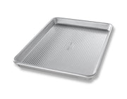 USA Pan Jelly Roll Pan with Lid, made of aluminized steel with a corrugated design, ideal for baking, roasting, and ensuring even heat distribution.