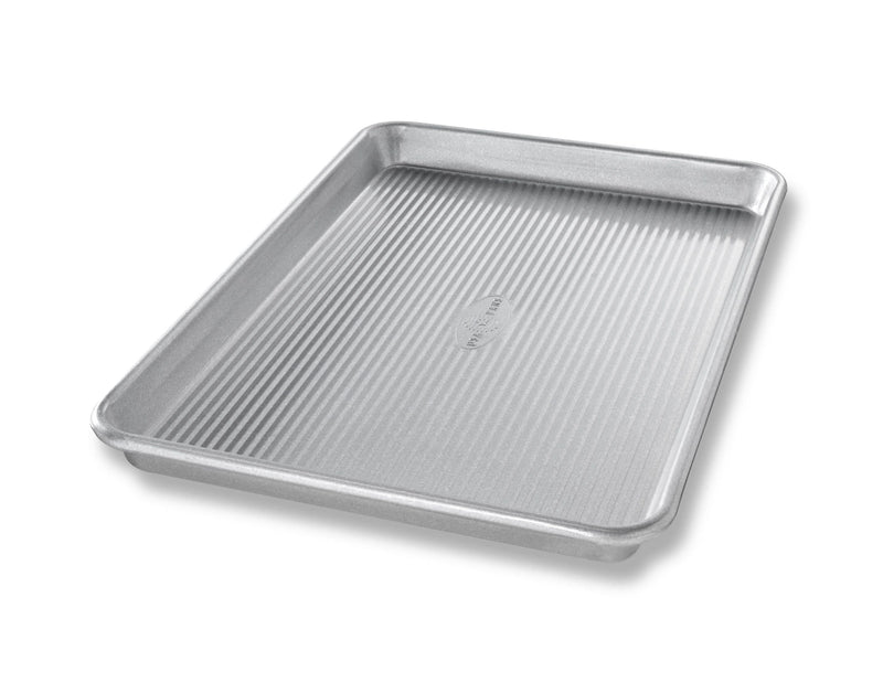 USA Pan Jelly Roll Pan with Lid, made of aluminized steel with a corrugated design, ideal for baking, roasting, and ensuring even heat distribution.