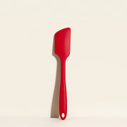 GIR Get It Right - GIR Ultimate Spatula: Sprinkles displayed on a white surface, showcasing its seamless design and flexible blade for versatile kitchen use.