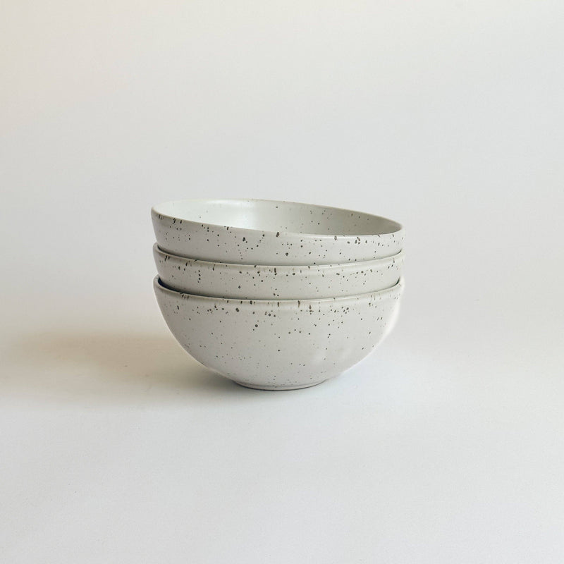 Sarah Kersten - Ramen Bowl: Classic White, a versatile ceramic bowl ideal for ramen, salads, or side dishes, displayed in a neat stack on a white surface.