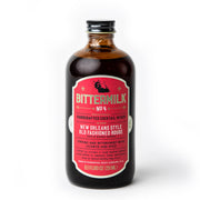 Bittermilk Bottling Co. - Bittermilk No.4 - New Orleans Style Old Fashioned Rouge cocktail mixer in a glass bottle with a red label, ideal for crafting cocktails.