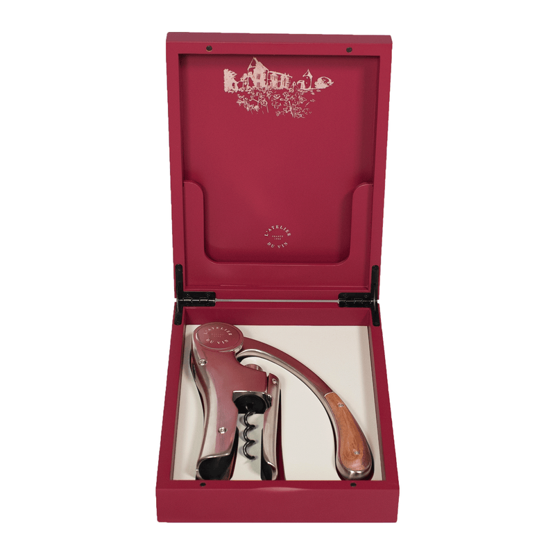 L'Atelier du Vin - USA - Lever Wine Opener - OENO MOTION TRESOR in a red presentation box with vineyard illustration, featuring a polished metal and wooden-handled corkscrew.