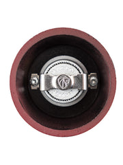 Peugeot | Bali Cast Iron Pepper Mill, Red, featuring a top-down view of its inner grinding mechanism, showcasing the Peugeot France stamped adjustment knob.