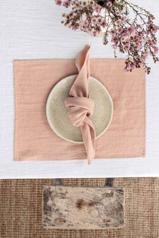 Set of 2 linen napkins on a plate, showcasing premium-quality linen, ideal for versatile table decor from Athens Cooks.