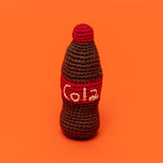 Ware of the Dog - Cotton Crochet Cola Dog Toy: A hand-crocheted, fair-trade dog toy resembling a classic soda bottle, made from organic cotton with a squeaker inside.