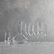 Zwiesel Fortessa | Pure Burgundy Goblet among clear glassware, showcasing postmodern elegance and functionality, perfect for sophisticated dining experiences from Athens Cooks.