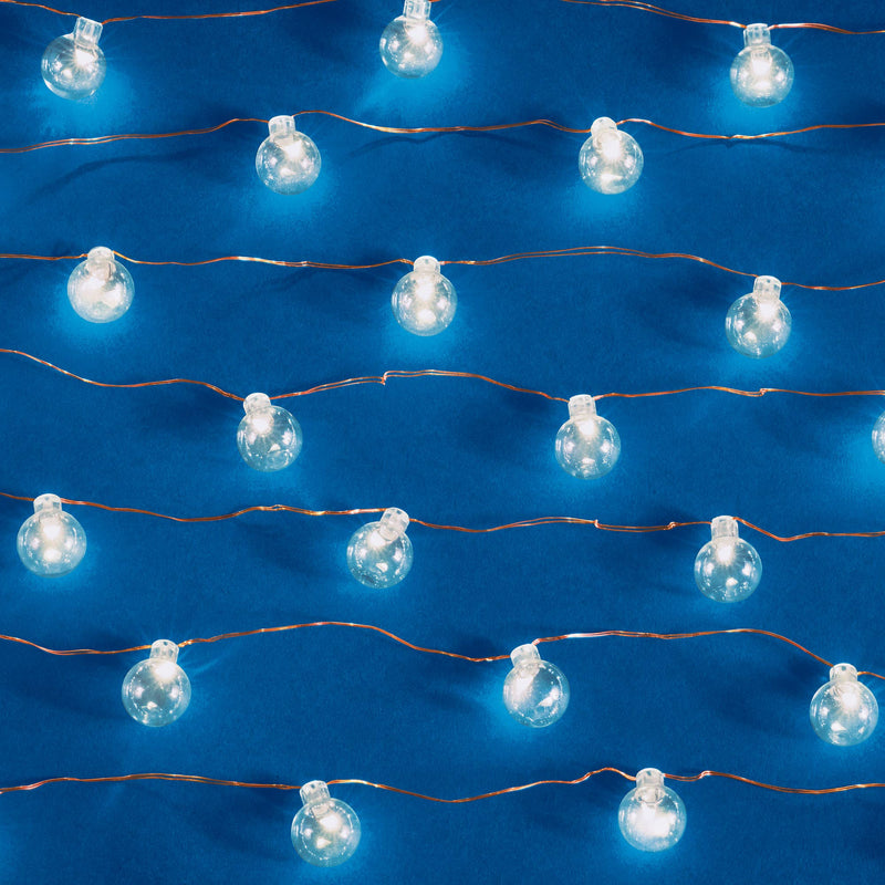 Napa Home & Garden - Napa Night Sky LED Mini Globe Lights, 24.6' Battery Operated, featuring warm white bulbs perfect for outdoor evening events.