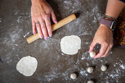 Earlywood | Dumpling Pin - Jatoba, a compact wooden tool for rolling dough, ideal for dumplings and more, shown on a kitchen surface, suitable for all skill levels.