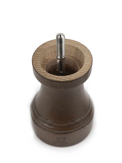 Peugeot | 1874 Manual Wooden Salt Mill Patinated, 4 inches, showing exposed metal spindle, capturing timeless craftsmanship and elegance inspired by the iconic 1874 Z model.