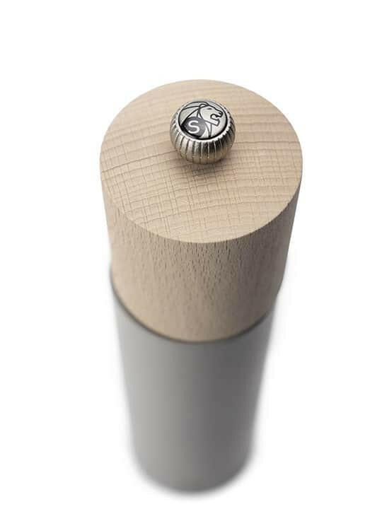 Peugeot | Boreal Salt + Pepper Mills - Sage Green Salt Mill: A close-up of a wooden and metal salt grinder, featuring a top adjustment knob marked with S for salt.