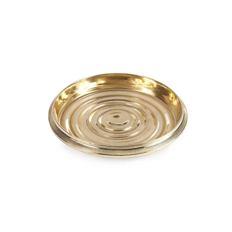 Sir|Madam Brass Bottle Coaster featuring a concentric-ring design, ideal for protecting surfaces from condensation, blending utility and elegance for kitchen or bar use.