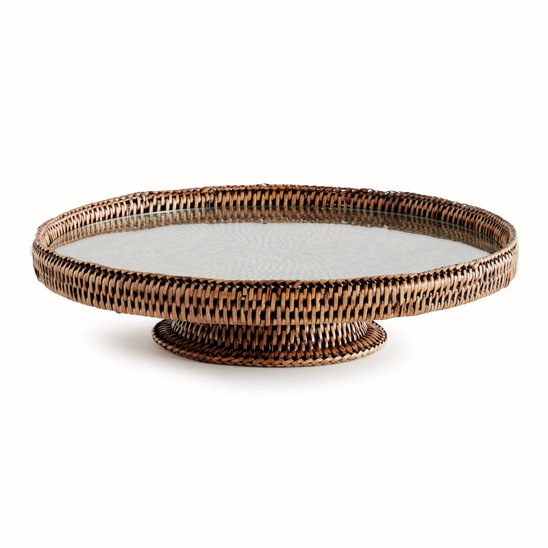 Napa Home & Garden - Burma Rattan Serving Stand features an oval wicker basket with a glass top, perfect for stylish kitchen or dining displays.