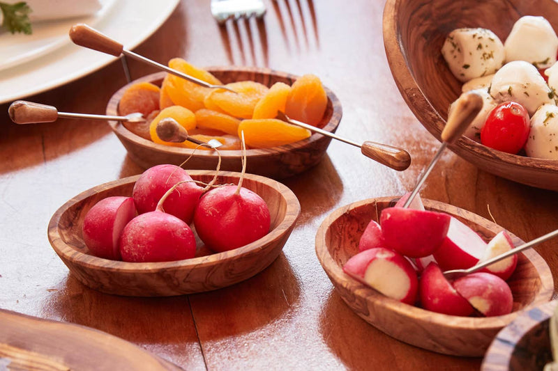 Verve Culture - Italian Olivewood Aperitivo Bowls hold radishes, apricots, mozzarella, and tomatoes, showcasing artisanal craftsmanship ideal for stylish appetizer presentation.