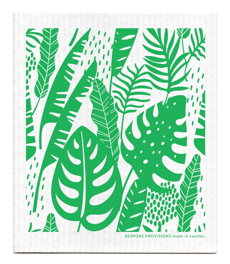 Bespoke Provisions - Tropical Leaves Swedish Dishcloth featuring a detailed green leaf pattern, designed for eco-friendly cleaning, made from cotton and cellulose, biodegradable and compostable.