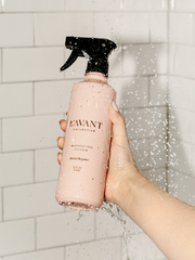 L'AVANT Collective - Multipurpose Surface Cleaner in Blushed Bergamot scent, held in a hand, ideal for diverse surfaces in kitchen settings.