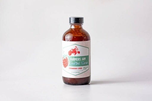 Farmers Jam Strawberry Lemonade Cocktail Syrup, 8oz amber-glass bottle, ideal for cocktails or mocktails, featuring organic ingredients from Georgia and South Carolina farms.