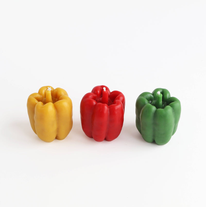 Artifaqt - Bell Pepper Beeswax Candle: Green, shaped like a bell pepper, showcasing beeswax craftsmanship, available in various colors, emphasizing natural, eco-friendly design.