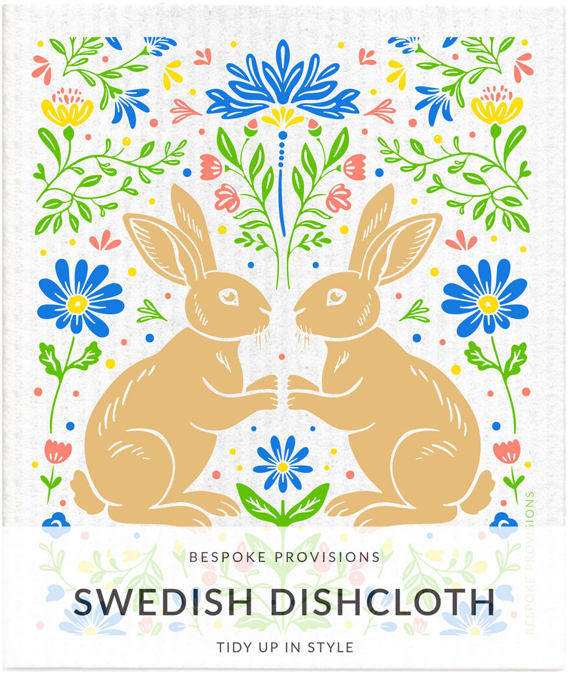 Bespoke Provisions - Rabbits Swedish Dishcloth featuring an illustration of rabbits and flowers, ideal for eco-friendly cleaning and gifting.