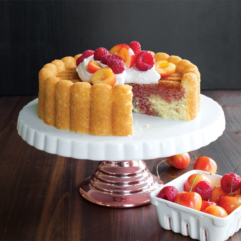 Nordic Ware | Charlotte Cake Pan showcasing a beautifully crafted fruit-topped cake, embodying a classic French dessert style, perfect for elegant baking presentations.