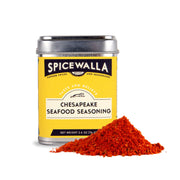 Spicewalla | Chesapeake Seafood Seasoning tin with a reddish-orange seasoning mound, ideal for enhancing seafood dishes, homemade chips, or savory cocktails.