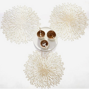 Chilewich | Bloom Placemats - Champagne featuring an intricate floral-inspired design, elegantly displayed with cups and spoons, highlighting its sophisticated dining enhancement.