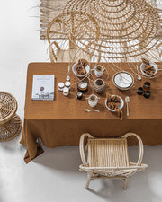 MagicLinen tablecloth, 59x98 inches, ideal for enhancing dining settings with its contemporary seam finish, suitable for both casual and formal occasions.