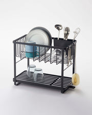 Yamazaki Home | Two-Tier Dish Rack, White features organized storage for dishes, mugs, utensils, and glasses with a slotted drip tray and rotating draining spout.