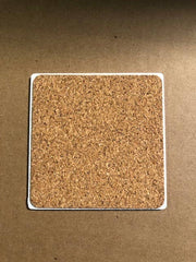 Drinks on Me - COASTER She Hugged Me: A square cork coaster with resin finish, featuring a humorous design. Perfect for protecting surfaces with playful charm.