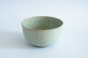 RachaelPots - Laura Bowl: Sage; a hand-thrown, ribbed ceramic bowl with a pale green glaze, ideal for versatile bowl meals.