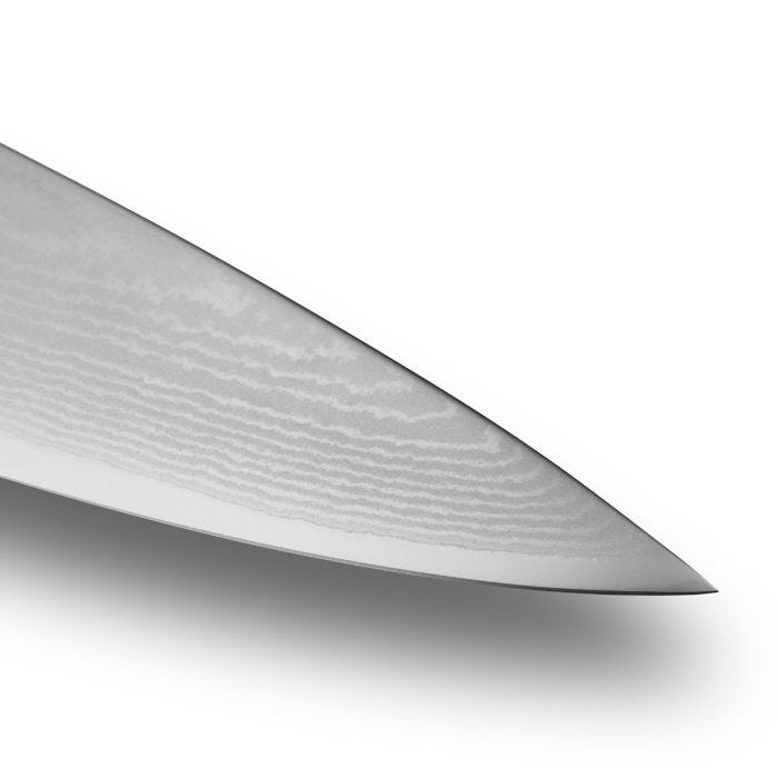 Shun Classic Chef's Blonde, 8-inch knife tip showcasing Damascus steel's wavy pattern, highlighting its sharp, multi-layered blade designed for versatile kitchen tasks.