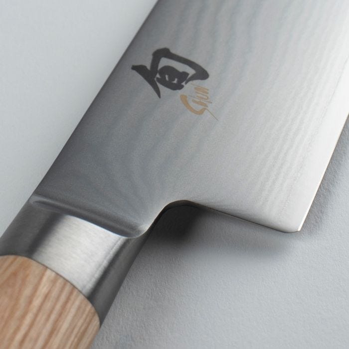Shun | Classic Chef's Blonde 8-inch knife features a stainless-steel nakiri-style blade with a wooden handle and Japanese maker's mark, essential for versatile kitchen tasks.
