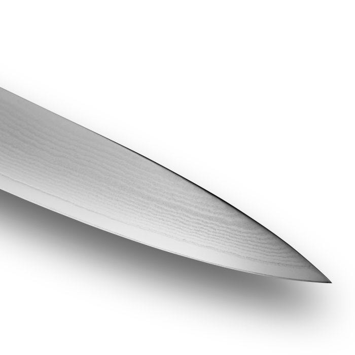Close-up of Shun Classic Paring Knife, 4 inches, showcasing its sharp Damascus-patterned blade, ideal for precise kitchen tasks and cutting small foods.