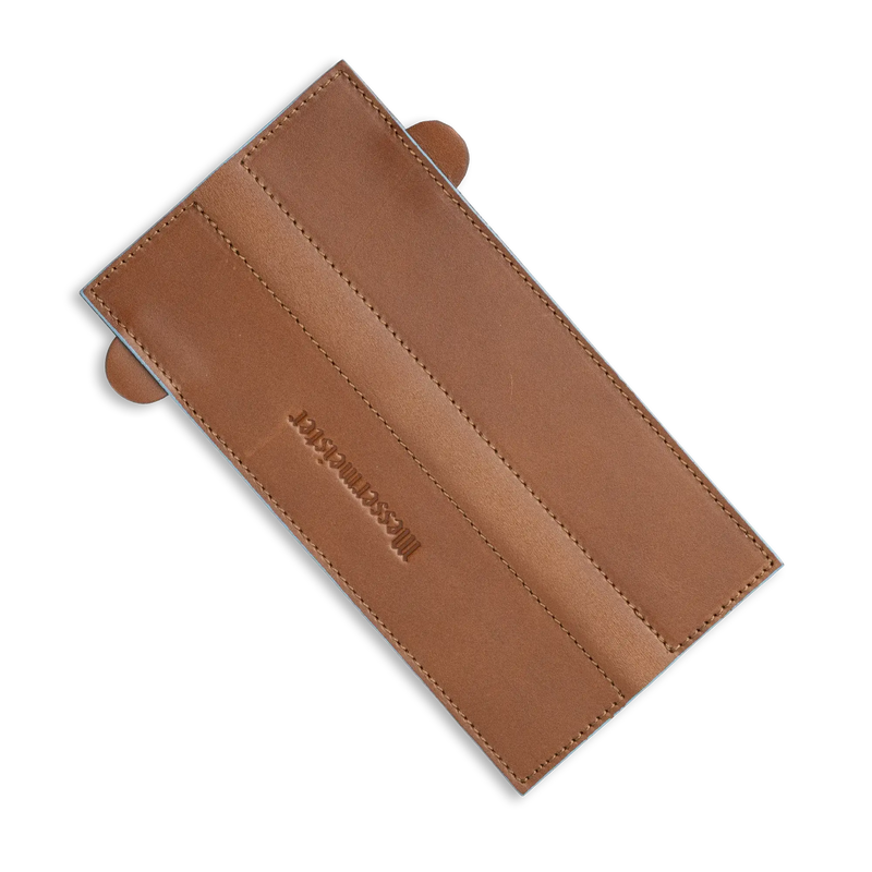 Messermeister - Leather Magnetic Edge-Guard - 6.5: Brown leather cover with stitched edges, designed to protect knife blades with secure magnetic closure.