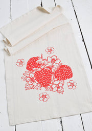 Hearth and Harrow - Strawberry Tea Towel features red strawberries and flowers on organic cotton, designed and printed in Rockport, Maine.
