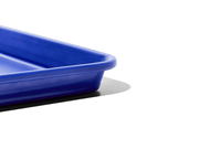 Great Jones | Little Sheet - Pepper, a small, nonstick sheet pan ideal for baking and reheating, showcased against a black backdrop, embodying Athens Cooks' curated kitchen essentials.
