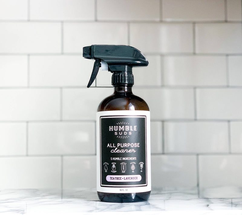 Humble Suds | All Purpose Cleaner in Refillable Glass Bottle - Orange & Clove, featuring a close-up of its sprayer and logo, ideal for kitchen use.