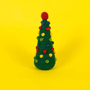 Ware of the Dog - Pom Pom Tree: A handcrafted, 8-inch crocheted Christmas tree with colorful pom-pom ornaments, made from fair-trade, 100% cotton with natural dyes.