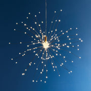 Napa Home & Garden - Napa Night Sky LED Starburst Lights Large, featuring 200 warm white LEDs on copper strands, ideal for outdoor festive lighting.