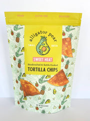 Alligator Pear Foods - Sweet Heat tortilla chips, 6oz bag, featuring thick, crispy chips made with whole grain corn, seasoned with pineapple and cayenne, perfect for snacking.