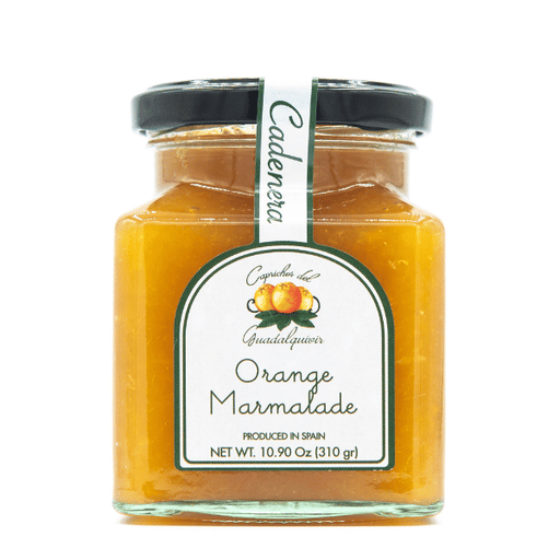 The French Farm - Caprichos Cadenera Orange Marmalade 10.90oz in a hexagonal jar with a black lid, labeled as Spanish-made with fresh, ripe oranges.